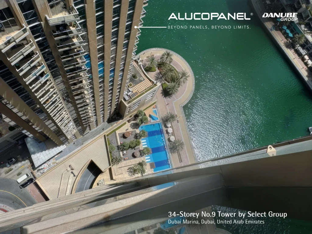 Exterior view of No.9 Tower in Dubai Marina with sleek glass and ACP façade overlooking the waterfront