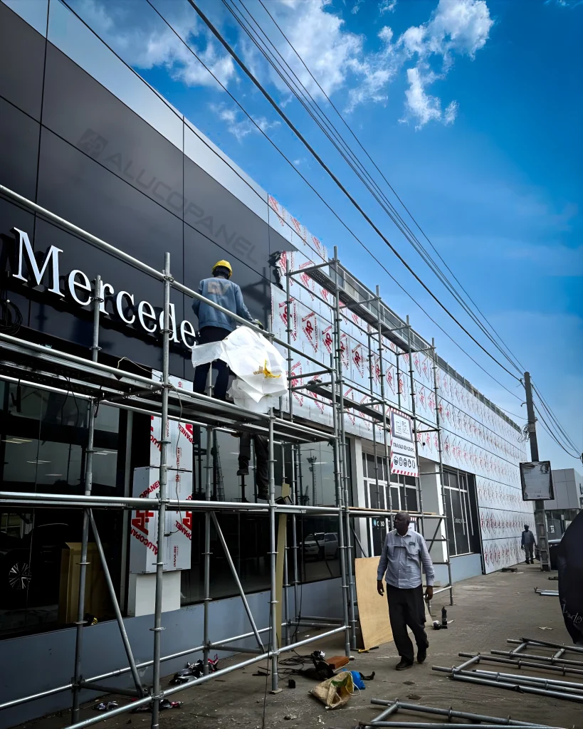 Mercedes-Benz showroom in Central Africa featuring a sleek modern façade finished with Alucopanel aluminium composite panels.